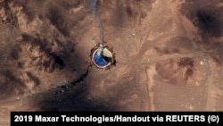 A satellite shows what is described as a burning launchpad in Iran on August 29.