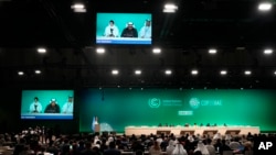 COP28 President Sultan al-Jaber speaks during a plenary stocktaking session at the COP28 UN climate summit in Dubai on December 11. 