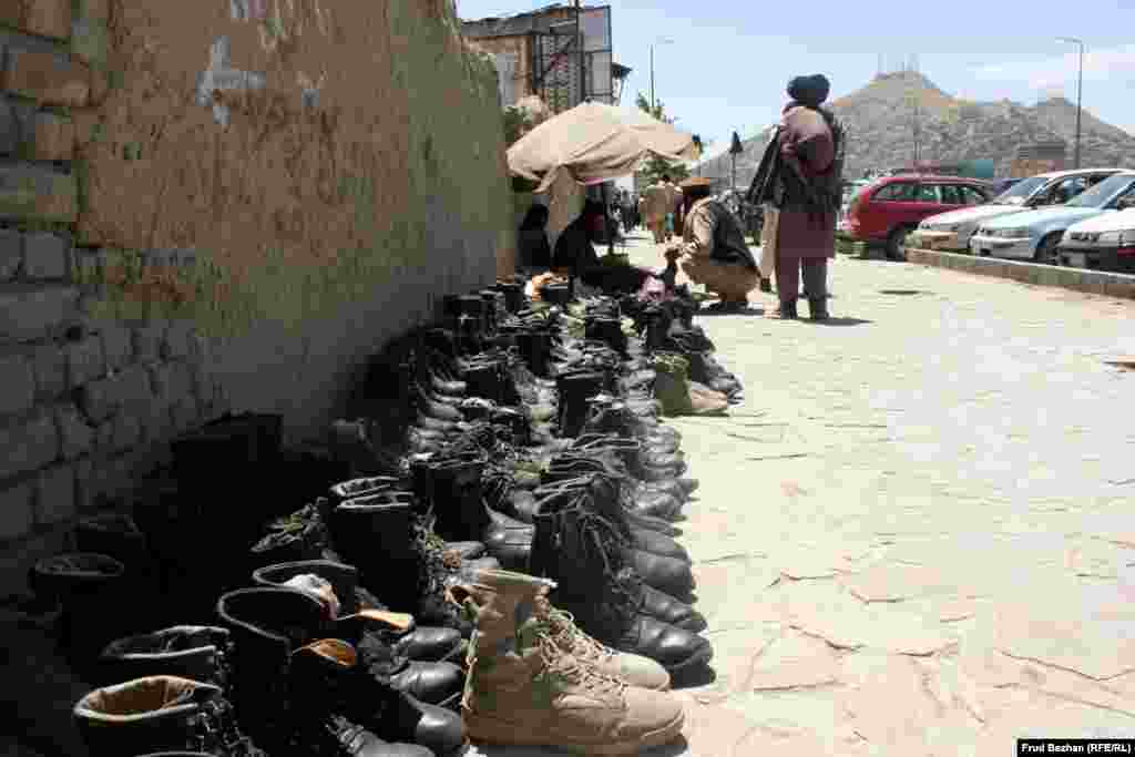 U.S. military boots being sold outside the &quot;Obama Bazaar&quot; in Kabul.&nbsp;