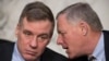 Senate Intelligence Committee Deputy Chairman Mark Warner (left) and Chairman Richard Burr hold a hearing to examine efforts to secure state election systems and to safeguard against foreign meddling earlier this year.