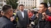 Communist Party politician Vyacheslav Markhayev (right) at a protest in the Siberian city of Ulan-Ude on September 10. 