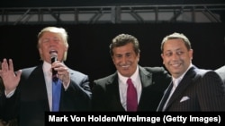 Donald Trump (left to right), Tevfik Arif, and Felix Sater attend the Trump Soho Launch Party in 2007 in New York.