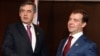 Brown (left) and Medvedev: cool in Japan on July 7