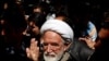 Karrubi Recognizes Ahmadinejad, Refugees Struggle