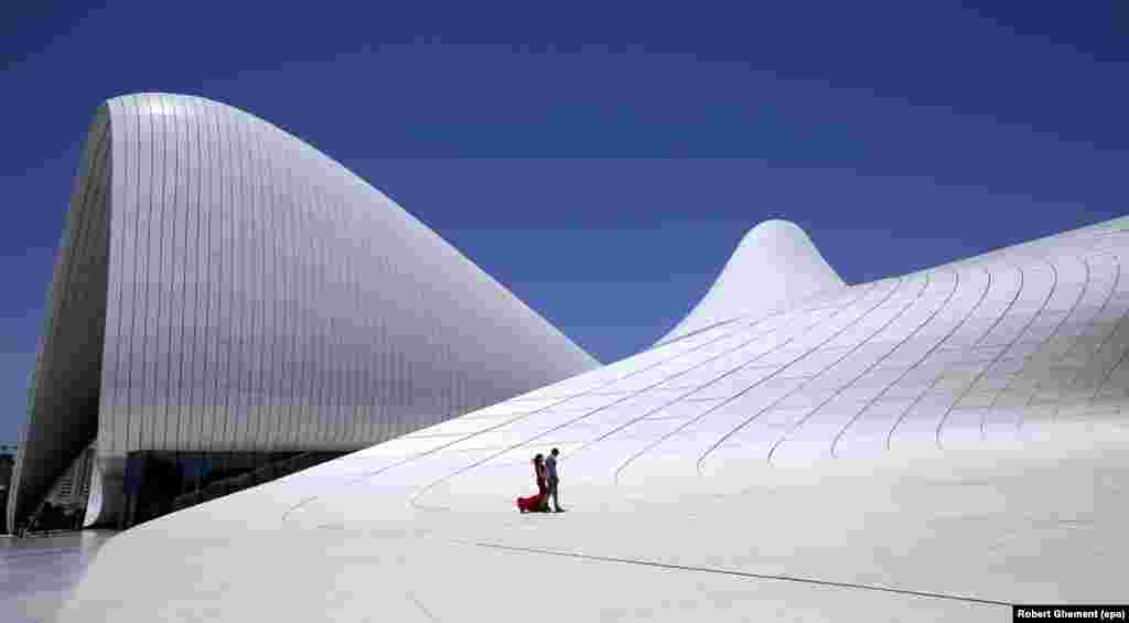 The curving lines of the Heydar Aliyev Center in downtown Baku. The complex is named after the father of Azerbaijan&#39;s current president. Azerbaijan has lived under the Aliyev family name since 1969.&nbsp;