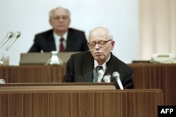 Just two days before his sudden death, Andrei Sakharov addresses the Soviet legislature on December 12, 1989. Soviet leader Mikhail Gorbachev can be seen in the background.