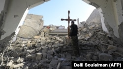 A heavily damaged Armenian Catholic Church in the Syrian city of Raqqa, pictured in 2017. (file photo)