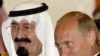 Putin and Saudi Foreign Minister Prince Saud al-Faisal at the Kremlin in July 2006