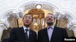 Iranian Parliament Speaker Ali Larijani (right) with UN Secretary-General Ban Ki-moon after he gave a speech upon his arrival in Tehran on August 29 ahead of the NAM summit. 