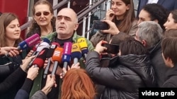 Vazha Gaprindashvili speaks to reporters after his release on December 28.