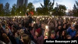 The sign seems to be making reference to a dispute over plans to build a Russian Orthodox cathedral in a park in Yekaterinburg, something which sparked large protests. (file photo)