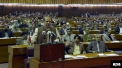 Pakistani Prime Minister Nawaz Sharif (left) speaks in parliament in Islamabad on January 29.