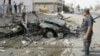 Dozen Dead In Attacks In Iraq