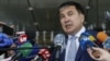 Mikheil Saakashvili speaks with journalists after meeting with members of Ukraine's Servant of the People parliament fraction in Kyiv on April 24.