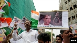 People in Calcutta, India, protest Pakistan's death sentence for Kulbhushan Jadhav in April.