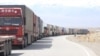 Kyrgyz truck drivers complain about the bottleneck at the Torugart border crossing with China.