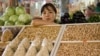 A female vendor at a market in Bishkek, Kyrgyzstan