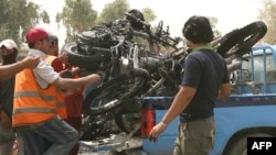 The June 26 bombing, the latest in a spate of attacks ahead of a planned U.S. withdrawal, struck a Baghdad motorbike bazaar.