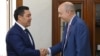 RFE/RL President Jamie Fly (right) meets Kyrgyz President Sadyr Japarov in Bishkek in September 2021.