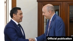 President and Chief Executive Officer of RFE/RL Jamie Fly meets with Kyrgyz President Sadyr Japarov in Bishkek in September 2021.