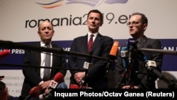 (Left to right:) French Foreign Minister Jean-Yves Le Drian, British Foreign Secretary Jeremy Hunt, and German Foreign Minister Heiko Maas speak to reporters in Bucharest on January 31. 