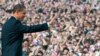 U.S. President Barack Obama waves after speaking at Prague Castle 