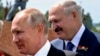 Belarusian President Alyaksandr Lukashenka (left) with Chinese President Xi Jinping in Beijing in September 2016.