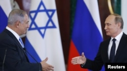 Russian President Vladimir Putin (right) meets with Israeli Prime Minister Benjamin Netanyahu in Moscow last year.