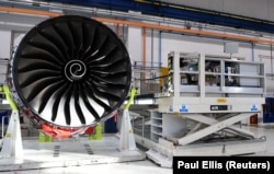 Rolls Royce Trent XWB engines, designed specifically for the Airbus A350 family of aircraft, are seen on the assembly line at a factory in England.