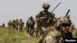 U.S. soldiers patrol with Afghan National Army soldiers in the Zharay district, Kandahar Province.