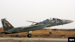 An Israeli F-16I jet fighter lands at an air base in the Negev Desert.